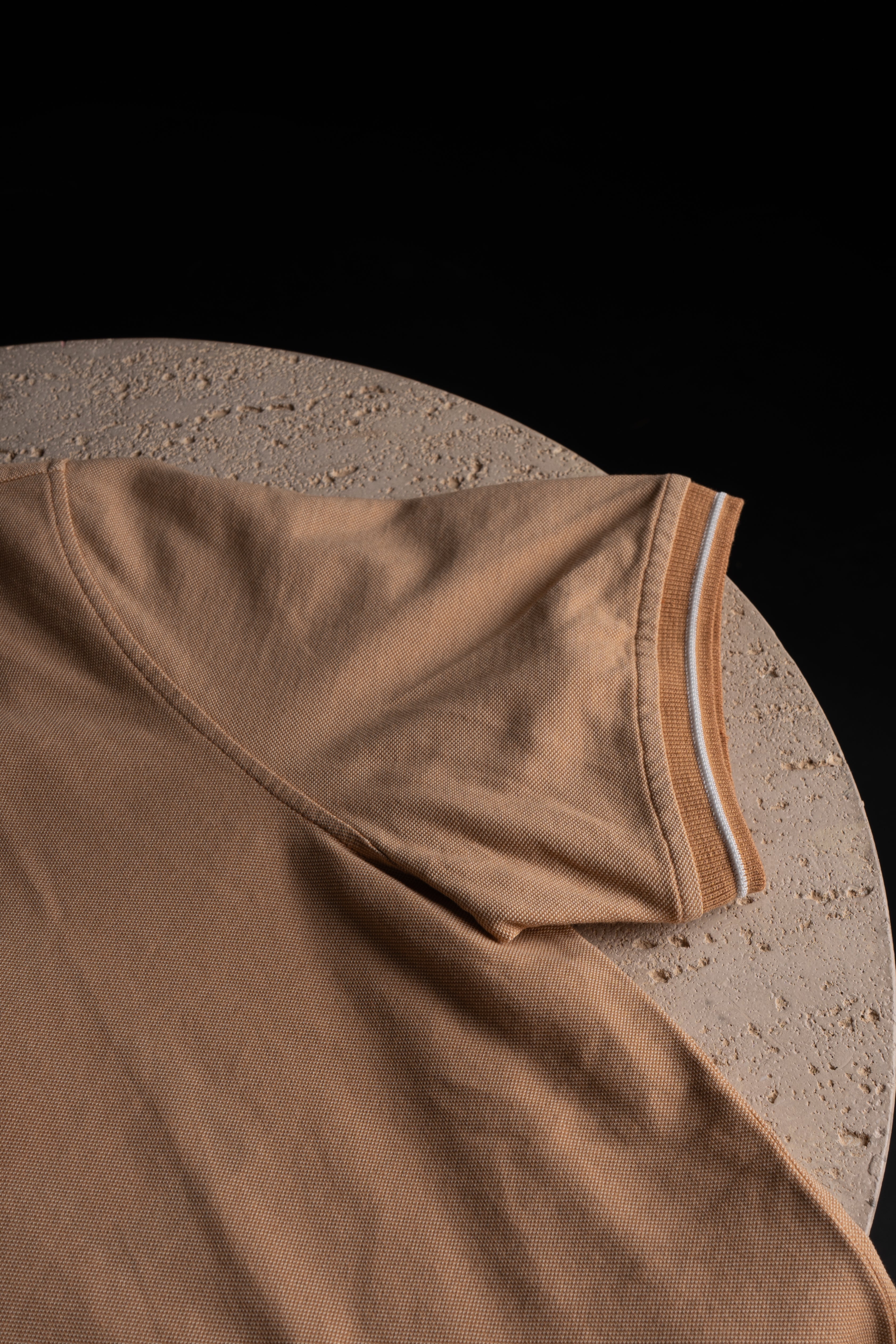 Manche du Polo CP Company Beige